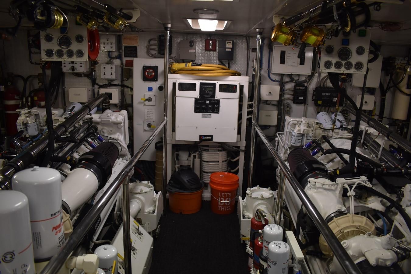 a room with machinery and equipment aboard 92' HATTERAS Yacht for Sale