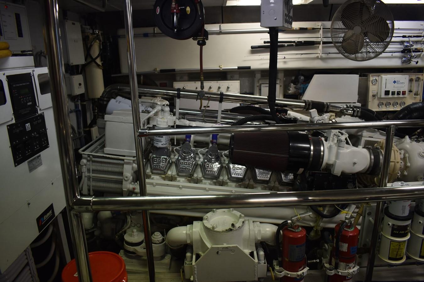 a large machine with many bottles aboard 92' HATTERAS Yacht for Sale