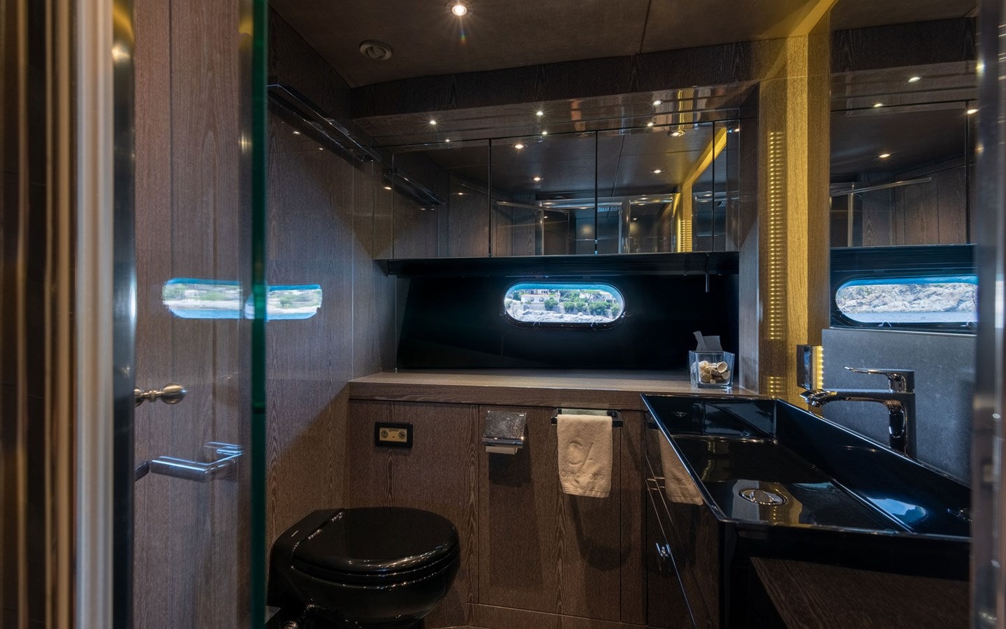 a bathroom with a large tv aboard MIRKA Yacht for Charter