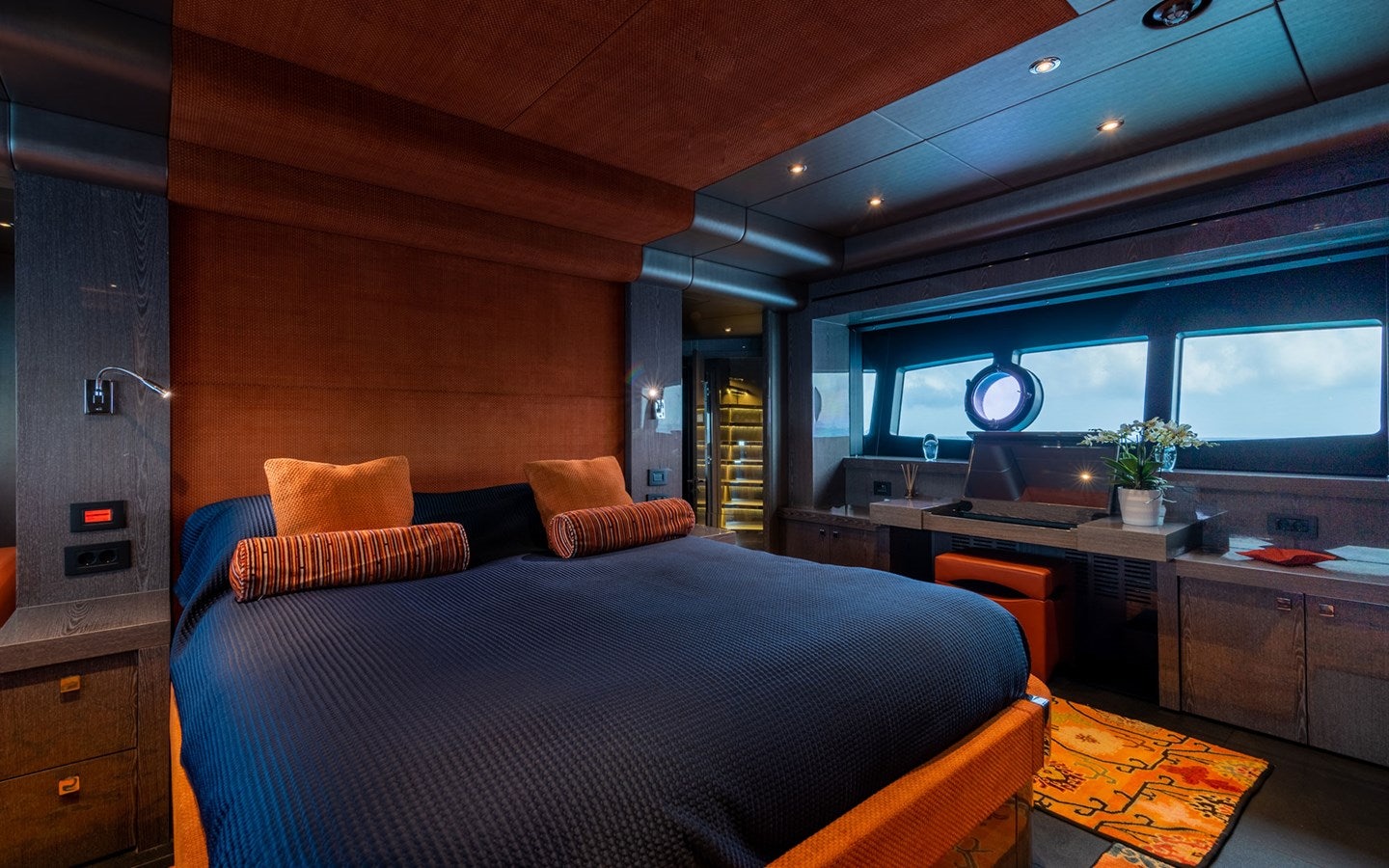 a bed in a room aboard MIRKA Yacht for Charter