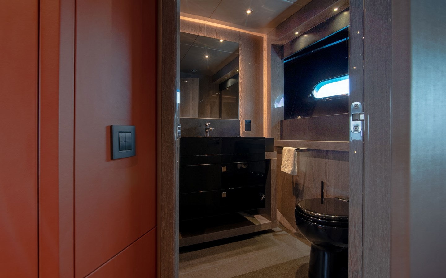 a bathroom with a mirror aboard MIRKA Yacht for Charter
