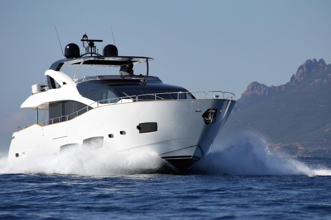 a white yacht in the water aboard GELATO Yacht for Sale