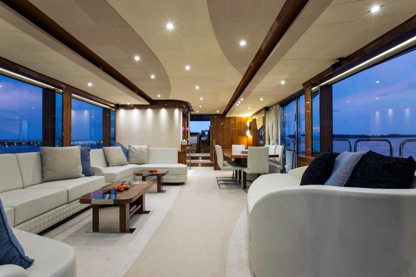 a living room with a large window aboard GELATO Yacht for Sale