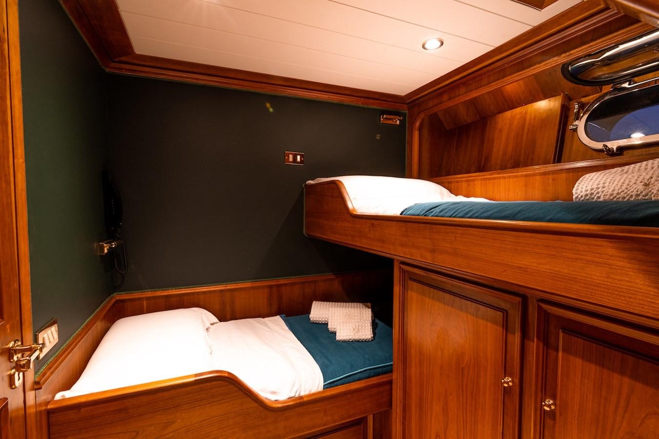 a room with two beds aboard A&A Yacht for Sale