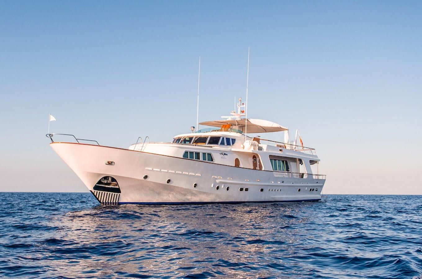 a white yacht in the water aboard A&A Yacht for Sale