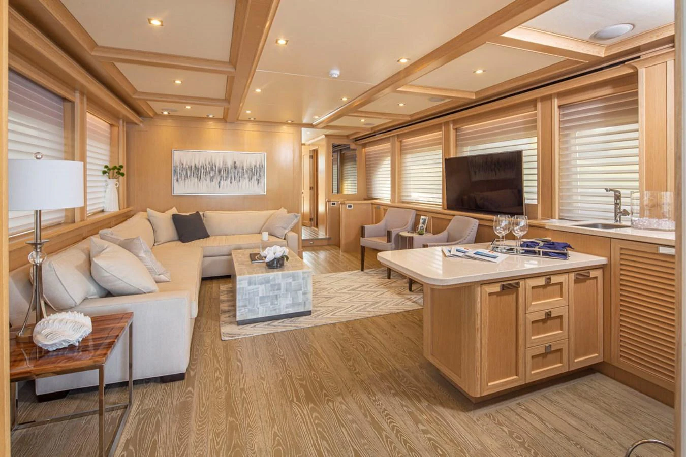 a living room with a couch and a tv aboard 92 PARAGON COCKPIT Yacht for Sale