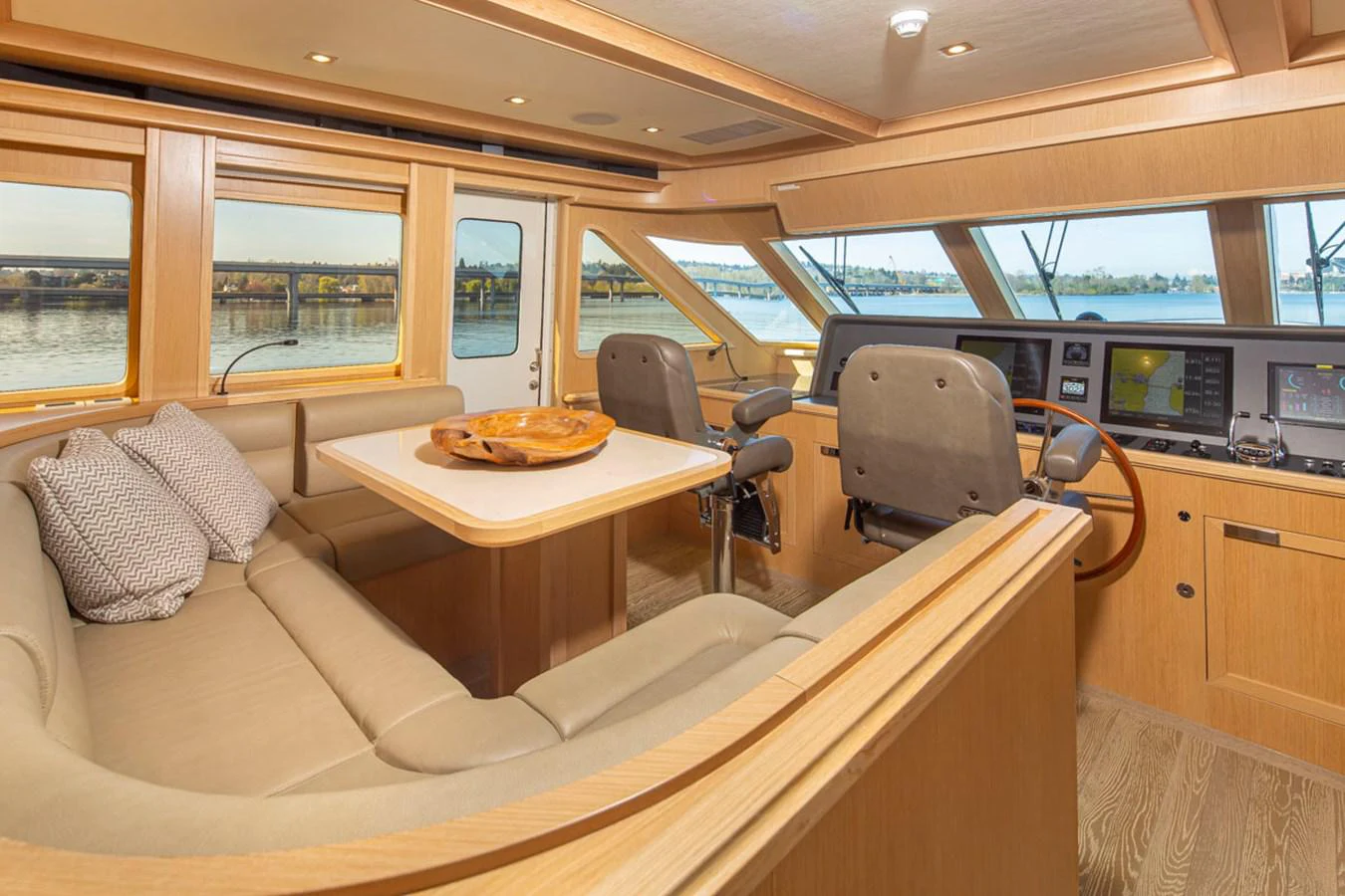 a table and chairs in a bus aboard 92 PARAGON COCKPIT Yacht for Sale