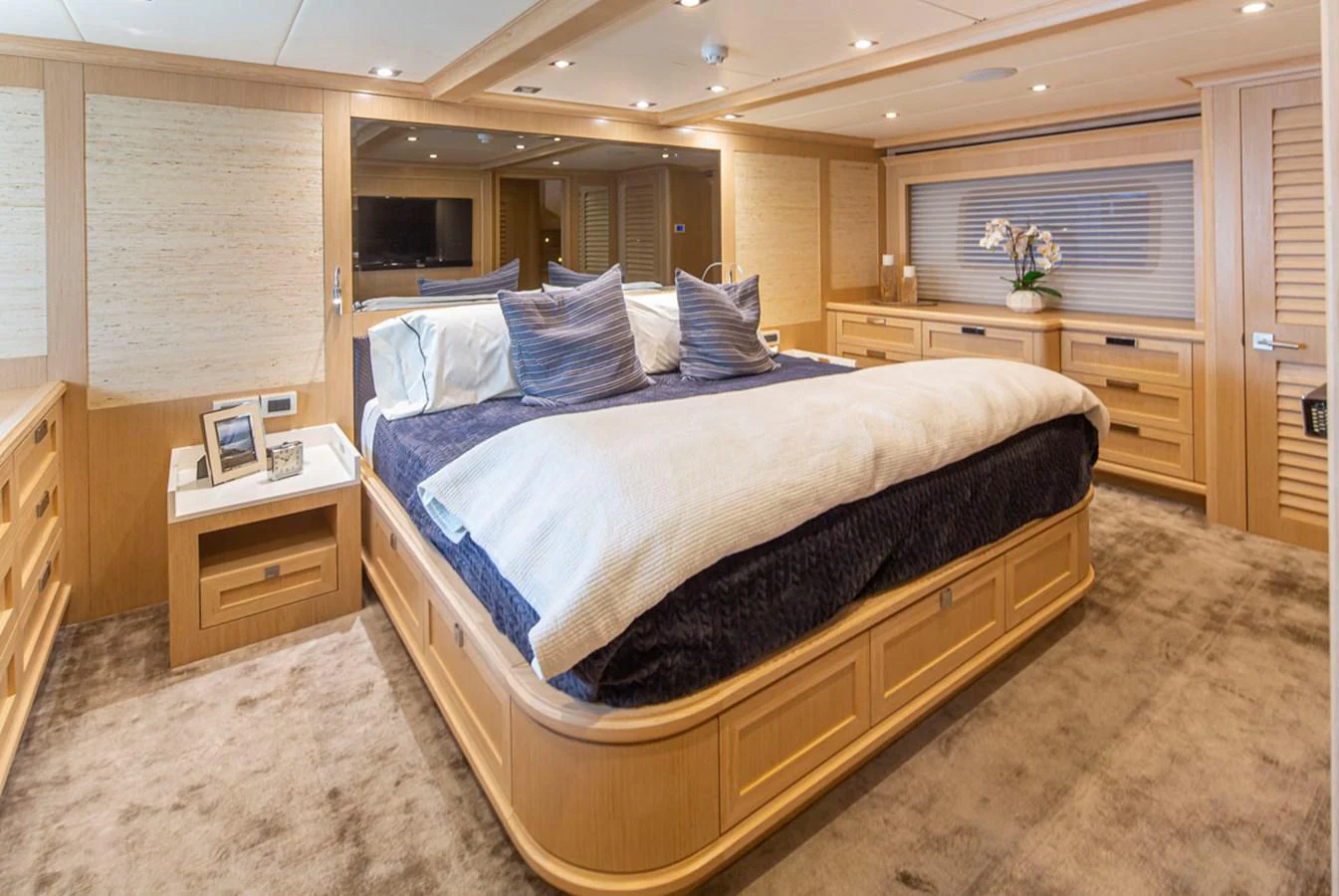 a large bed in a room aboard 92 PARAGON COCKPIT Yacht for Sale