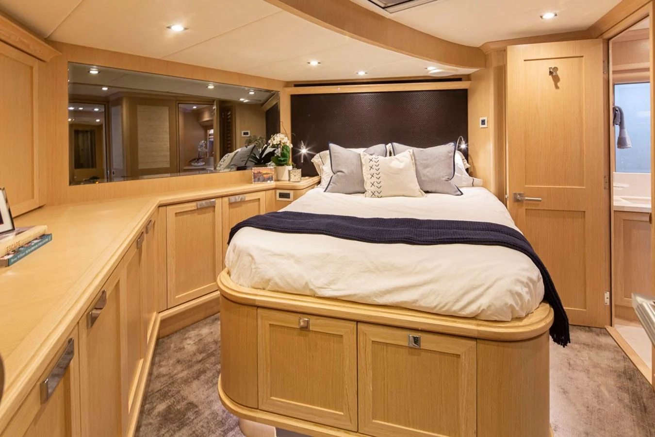 a bedroom with a bed aboard 92 PARAGON COCKPIT Yacht for Sale