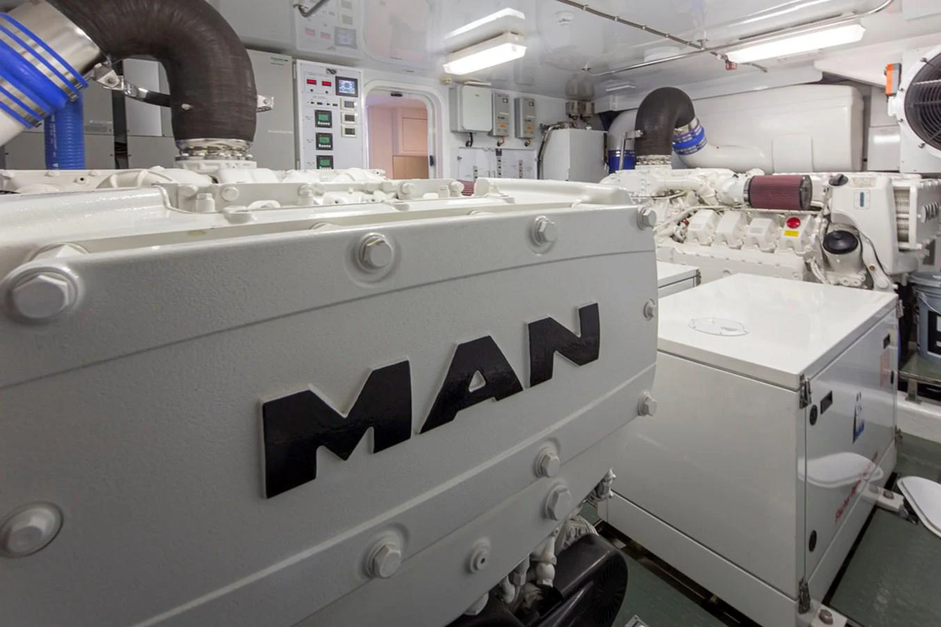 a white machine with black text aboard 92 PARAGON COCKPIT Yacht for Sale