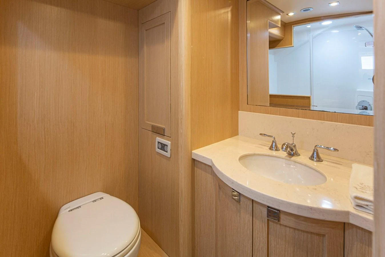 a bathroom with a sink and a toilet aboard 92 PARAGON COCKPIT Yacht for Sale