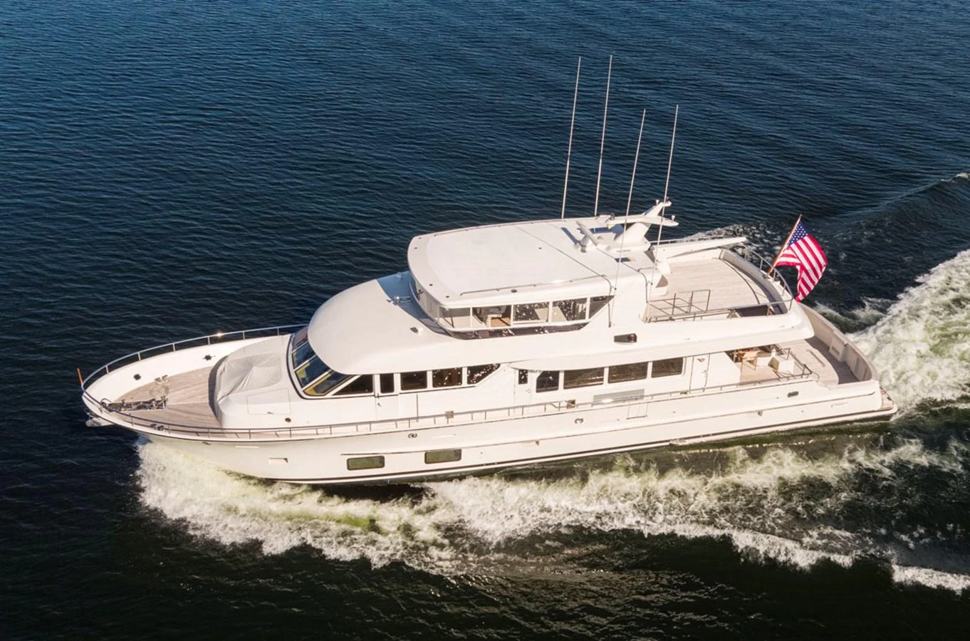 a boat on the water aboard 92 PARAGON COCKPIT Yacht for Sale