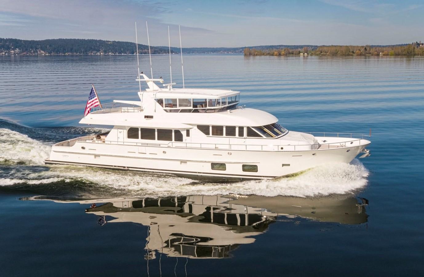 a large white yacht on the water aboard 92 PARAGON COCKPIT Yacht for Sale