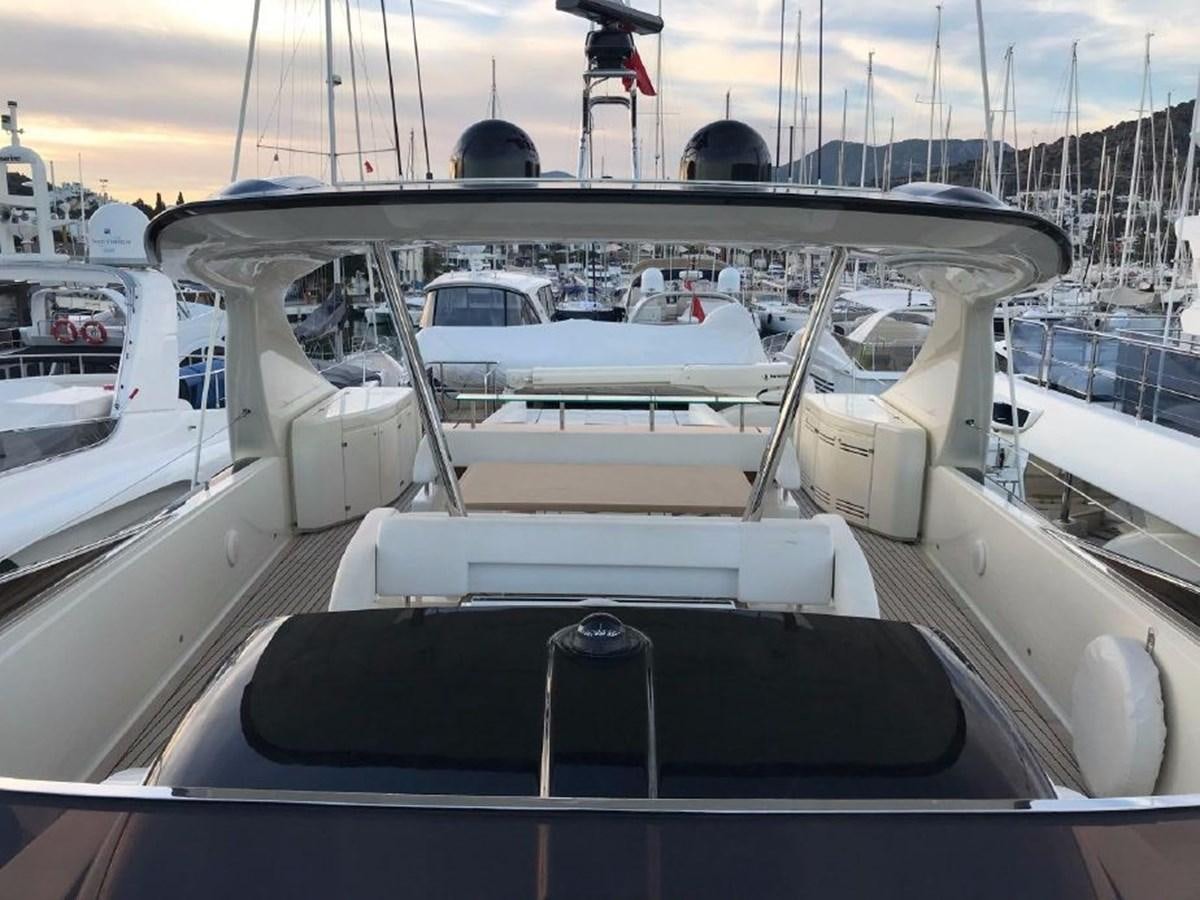 a boat with a steering wheel aboard BLACK SWAN Yacht for Sale