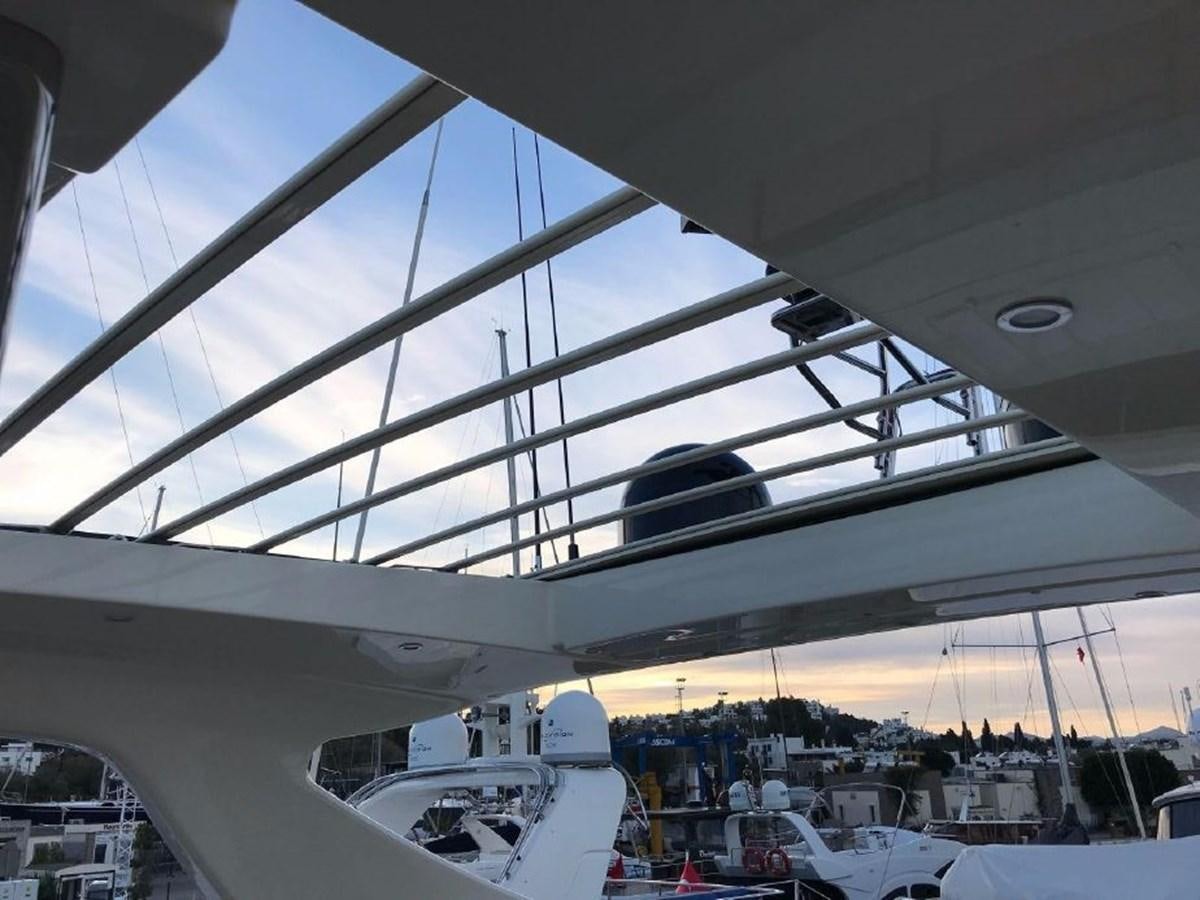 a large white airplane aboard BLACK SWAN Yacht for Sale