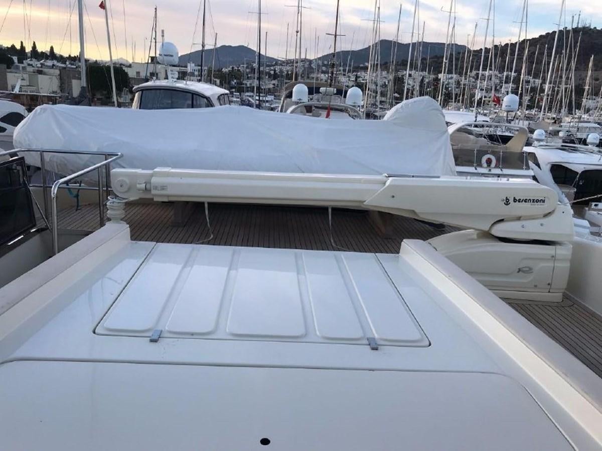 a row of boats on a deck aboard BLACK SWAN Yacht for Sale