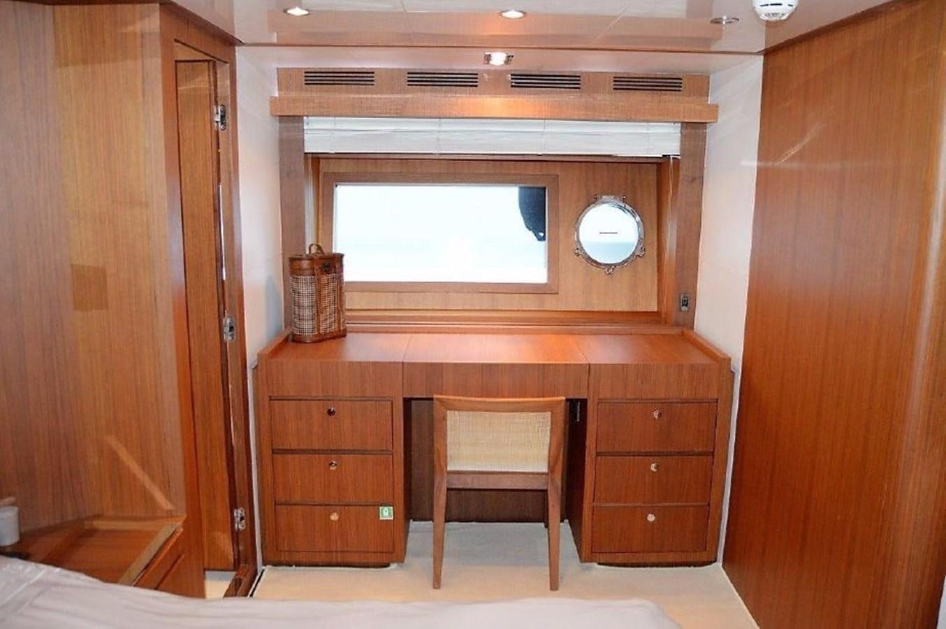 a room with a chair and a desk aboard BLACK SWAN Yacht for Sale