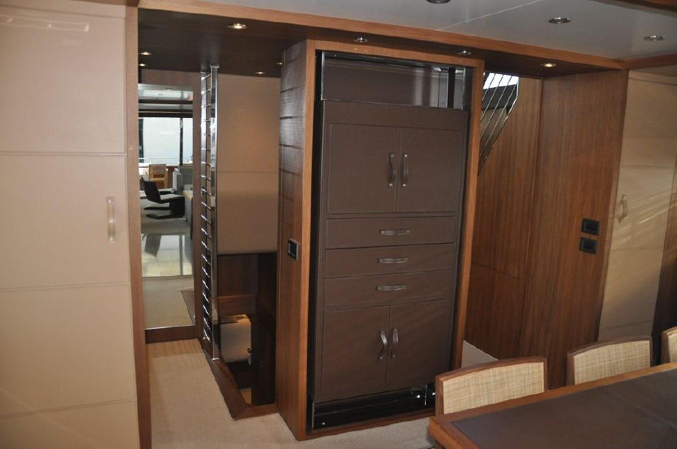 a room with a desk and a chair aboard TAURUS Yacht for Sale