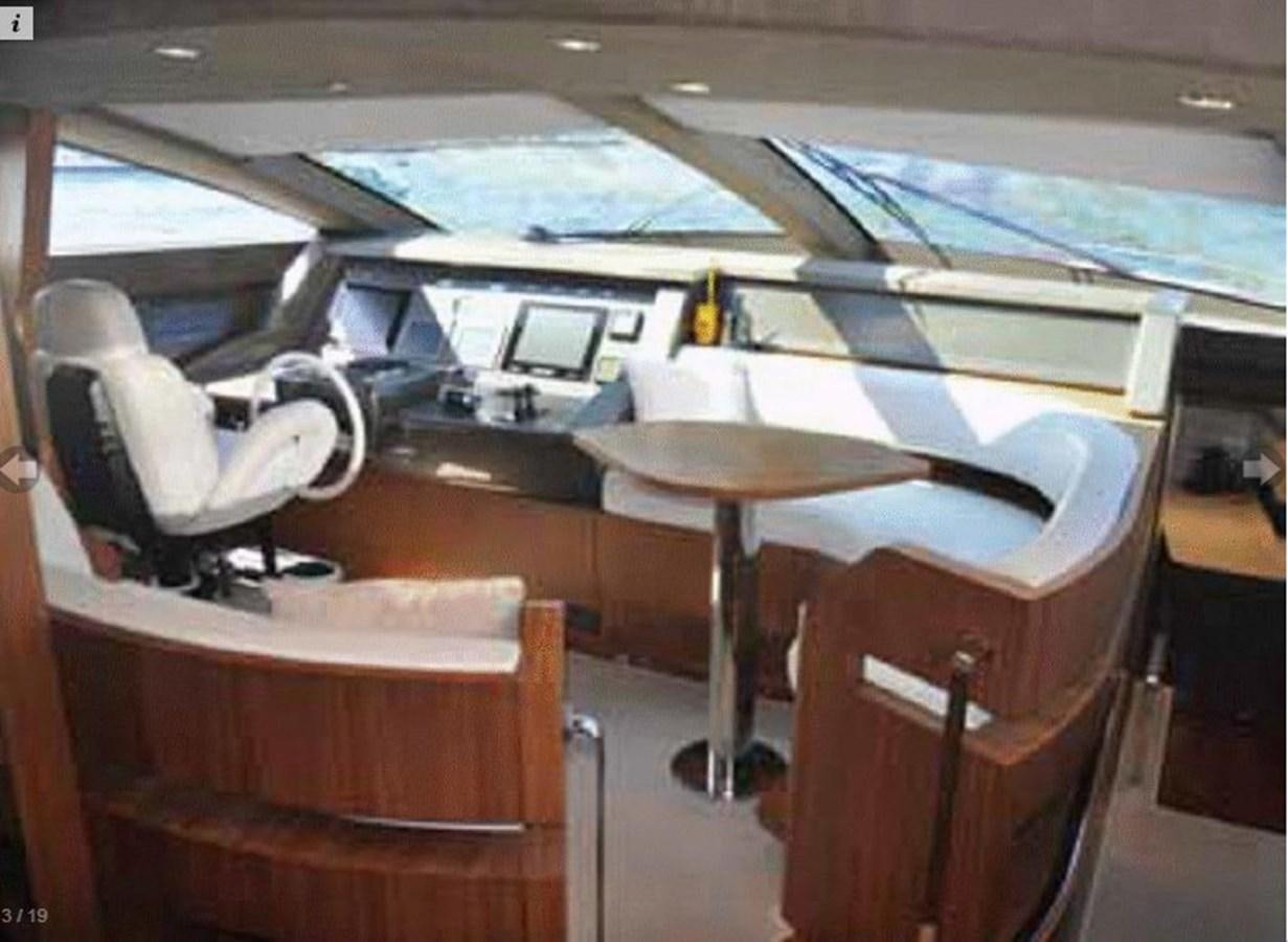 a desk with a chair and a desk in front of it aboard TAURUS Yacht for Sale