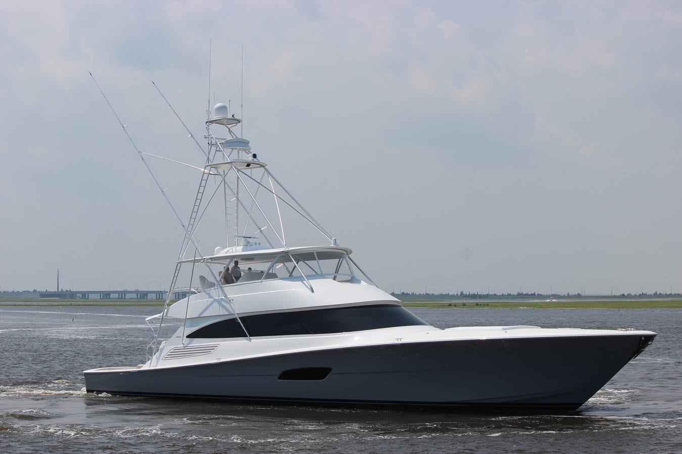 a white boat on the water aboard 2022 VIKING 92 CONVERTIBLE (TBD) Yacht for Sale