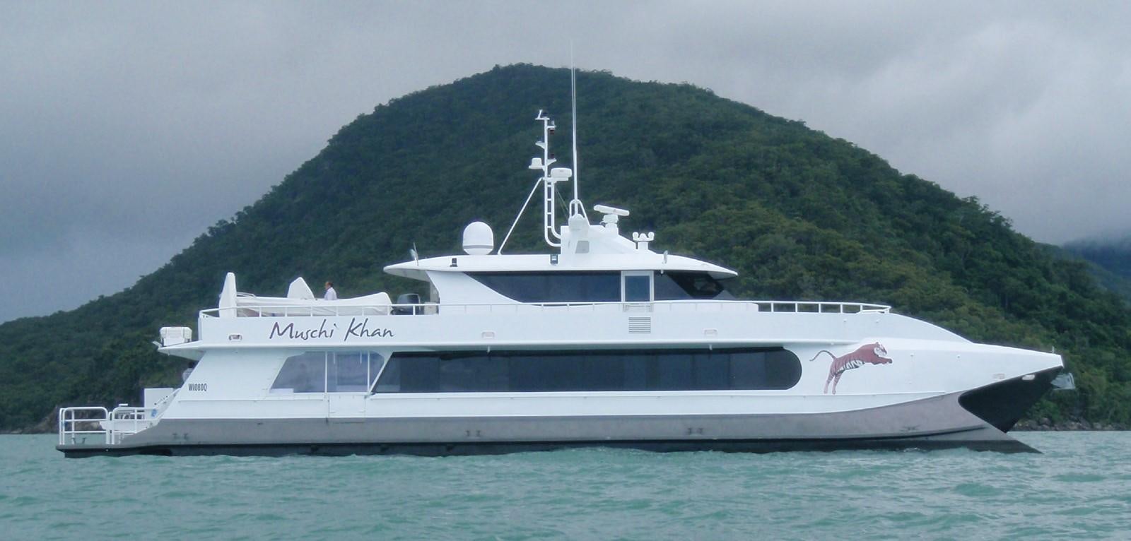 a large white boat in the water aboard MUSHI KHAN Yacht for Sale