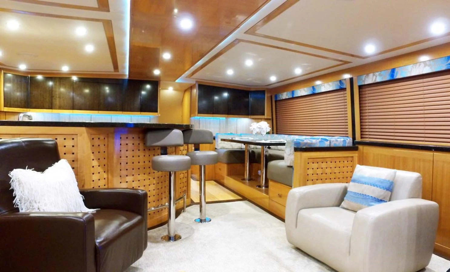 a room with a table and chairs aboard SILKY Yacht for Sale