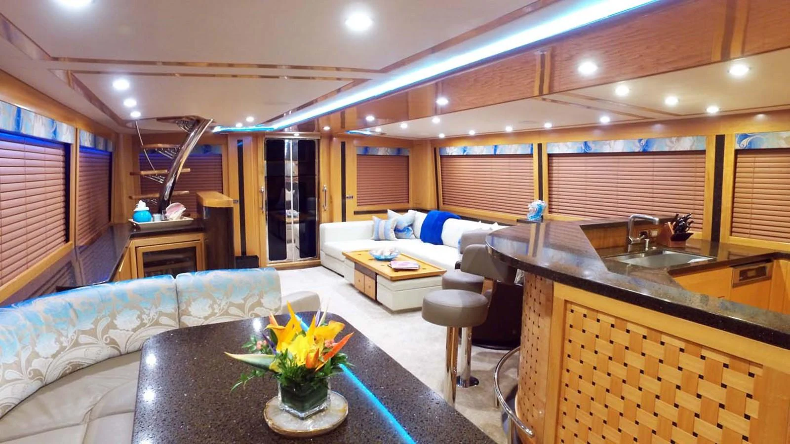 a living room with a couch and a table aboard SILKY Yacht for Sale