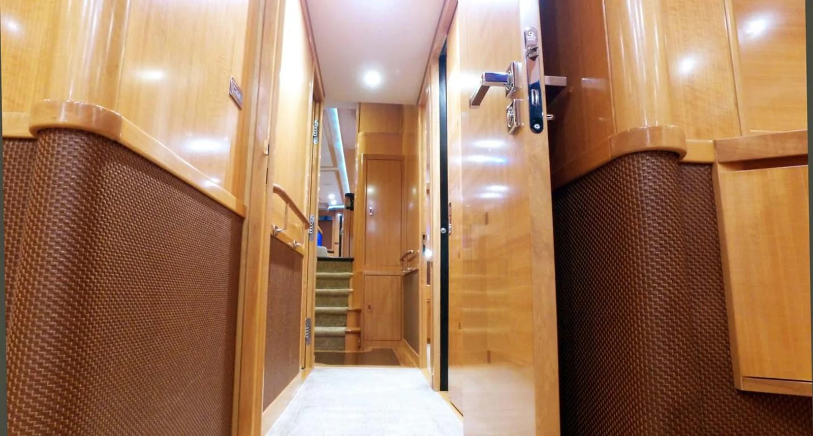 a room with wooden doors aboard SILKY Yacht for Sale