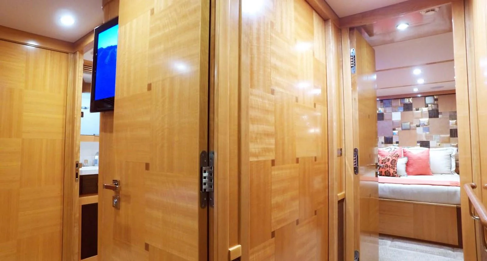 a room with a bed and a television aboard SILKY Yacht for Sale