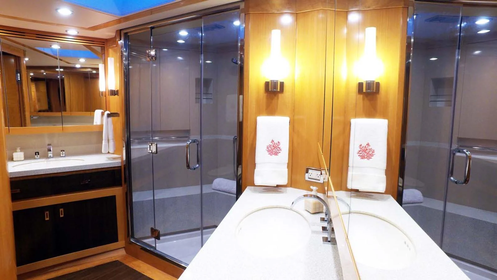 a bathroom with a shower and a sink aboard SILKY Yacht for Sale