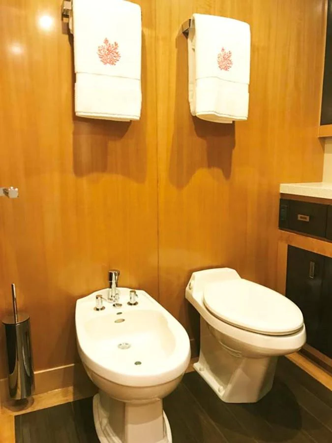 a bathroom with a toilet and sink aboard SILKY Yacht for Sale