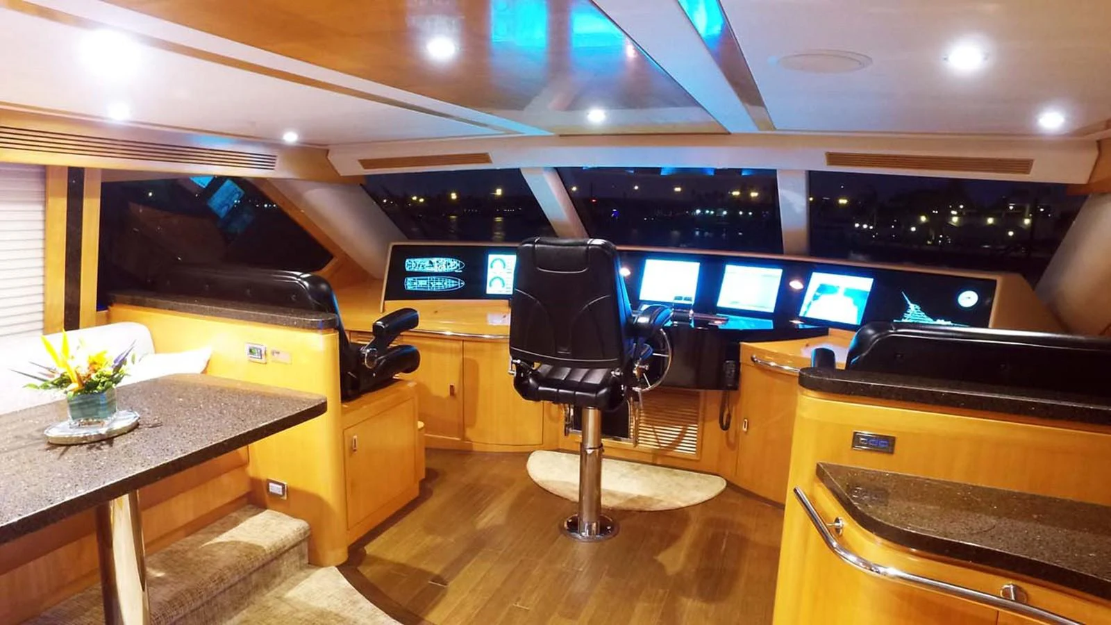 a room with a desk and chairs aboard SILKY Yacht for Sale