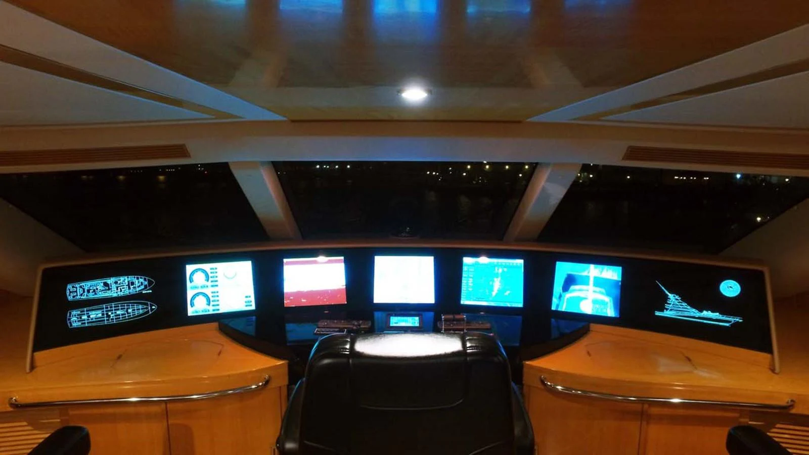 a row of computer screens aboard SILKY Yacht for Sale
