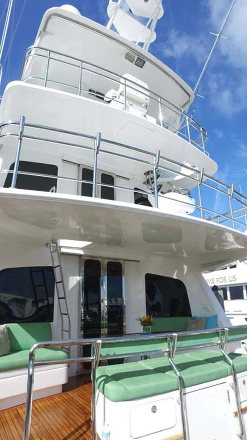 a white boat on a deck aboard SILKY Yacht for Sale