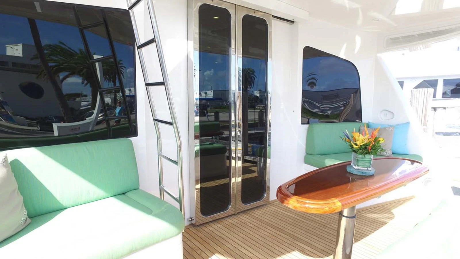 a room with a table and chairs aboard SILKY Yacht for Sale