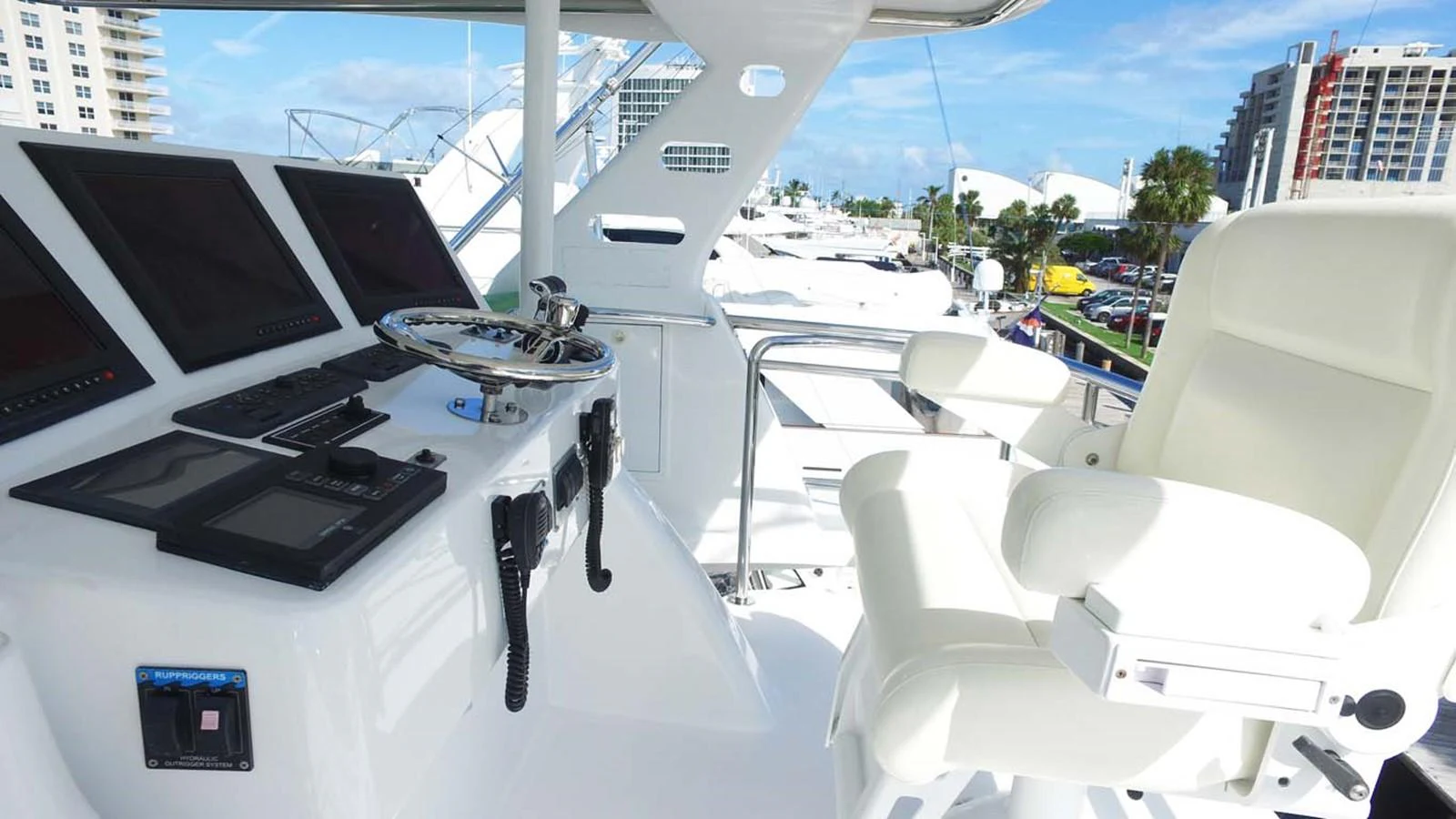 a group of white chairs aboard SILKY Yacht for Sale