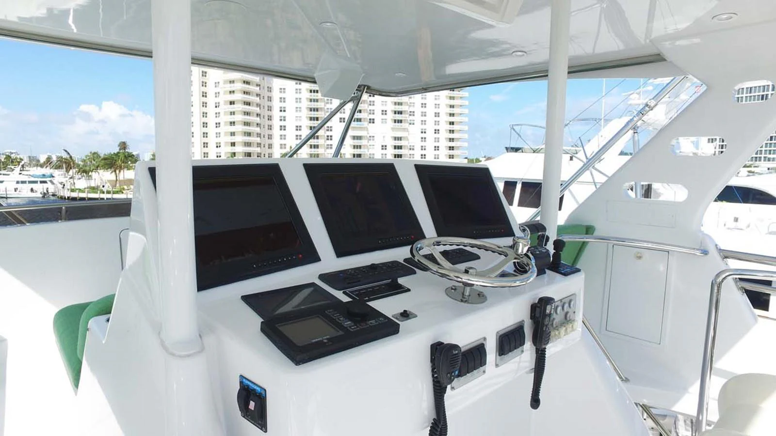 a white table with laptops on it aboard SILKY Yacht for Sale