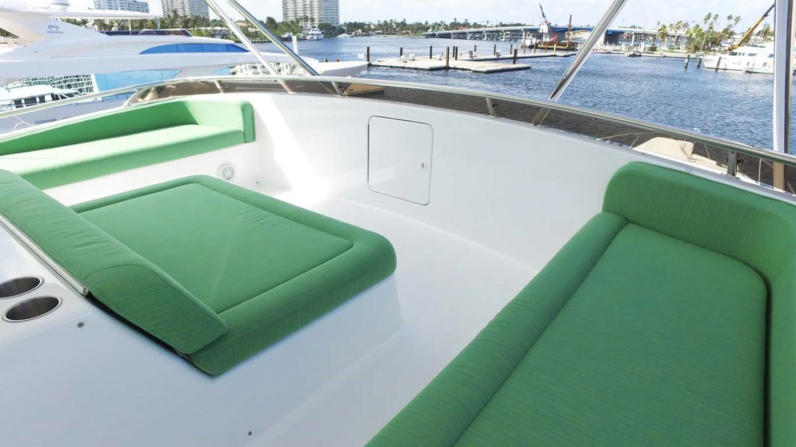 a green boat on a body of water aboard SILKY Yacht for Sale