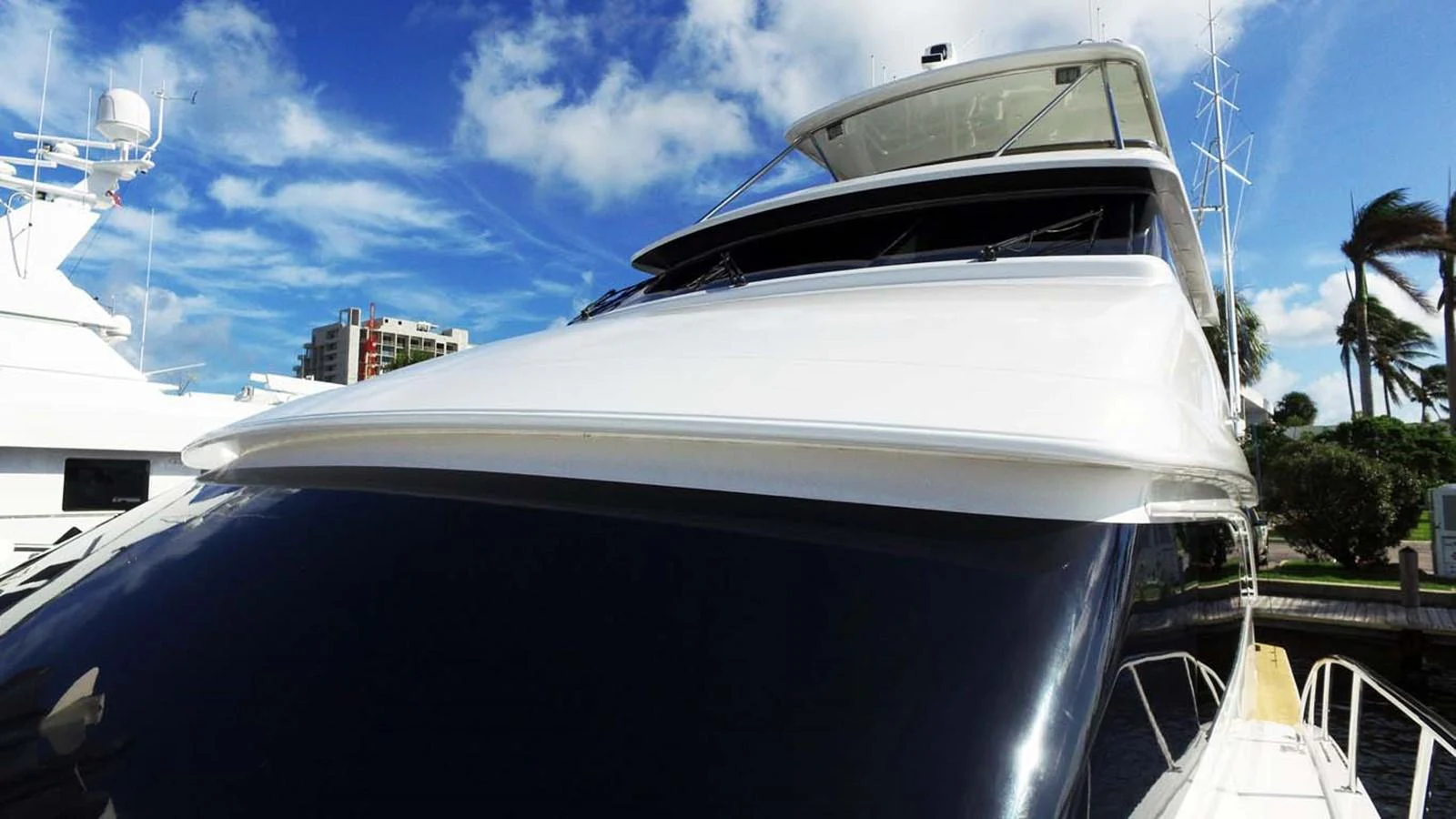 a white yacht in a dock aboard SILKY Yacht for Sale