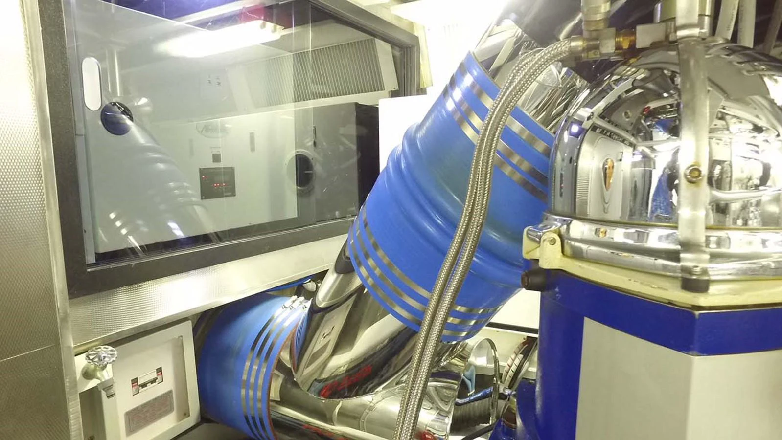 a machine with a blue cover aboard SILKY Yacht for Sale