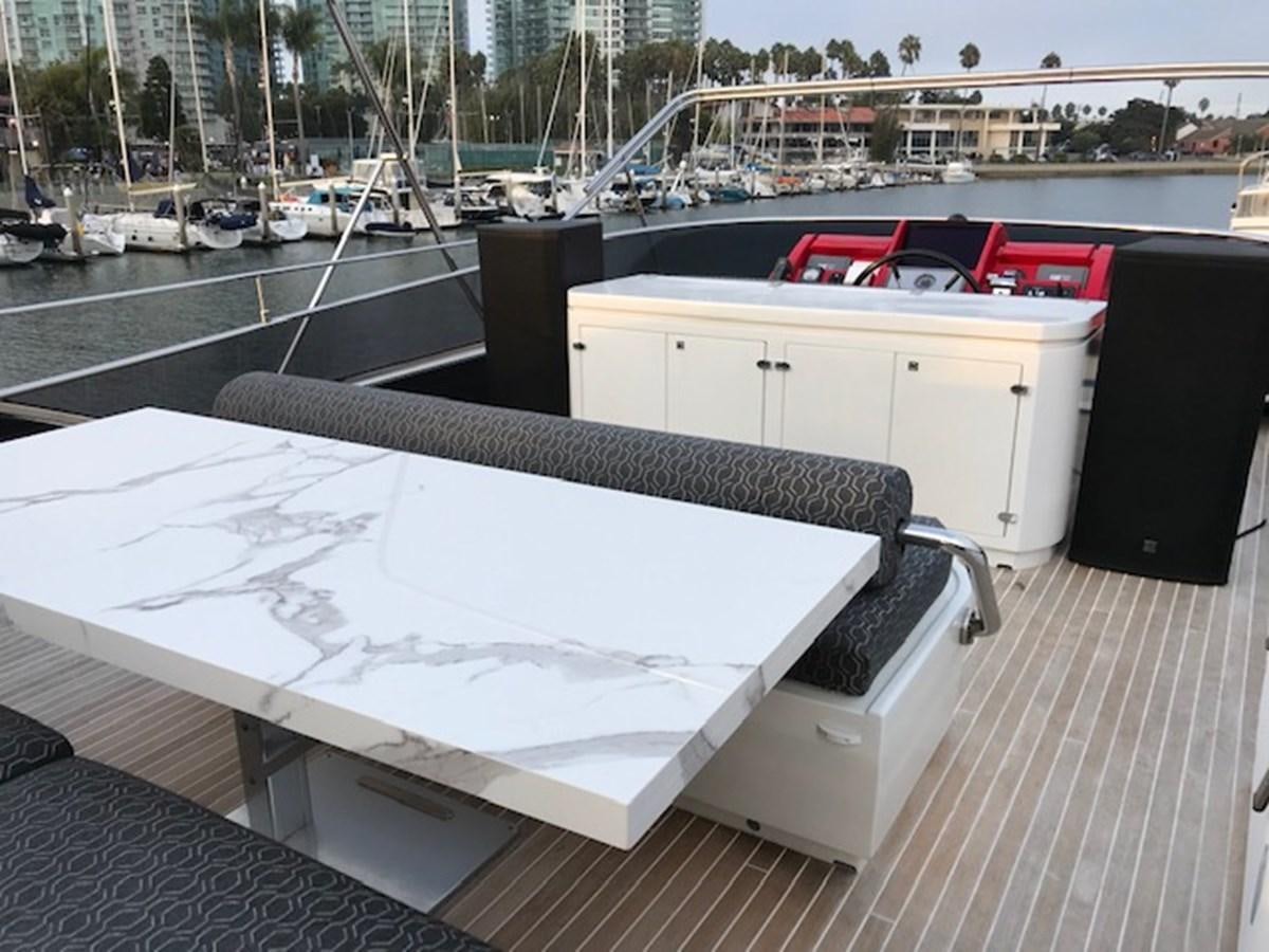 a white rectangular object with a black object on it aboard KISSES Yacht for Sale