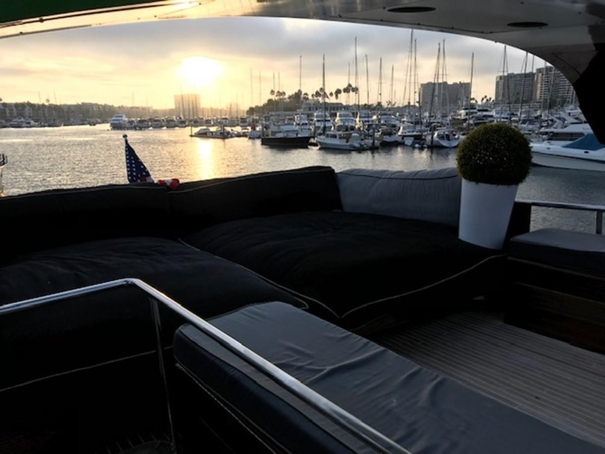 a view of a marina with boats and plants aboard KISSES Yacht for Sale