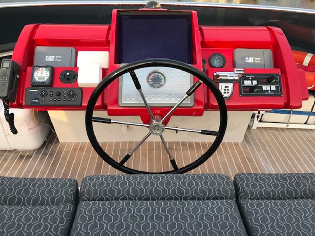 a bicycle in a car aboard KISSES Yacht for Sale