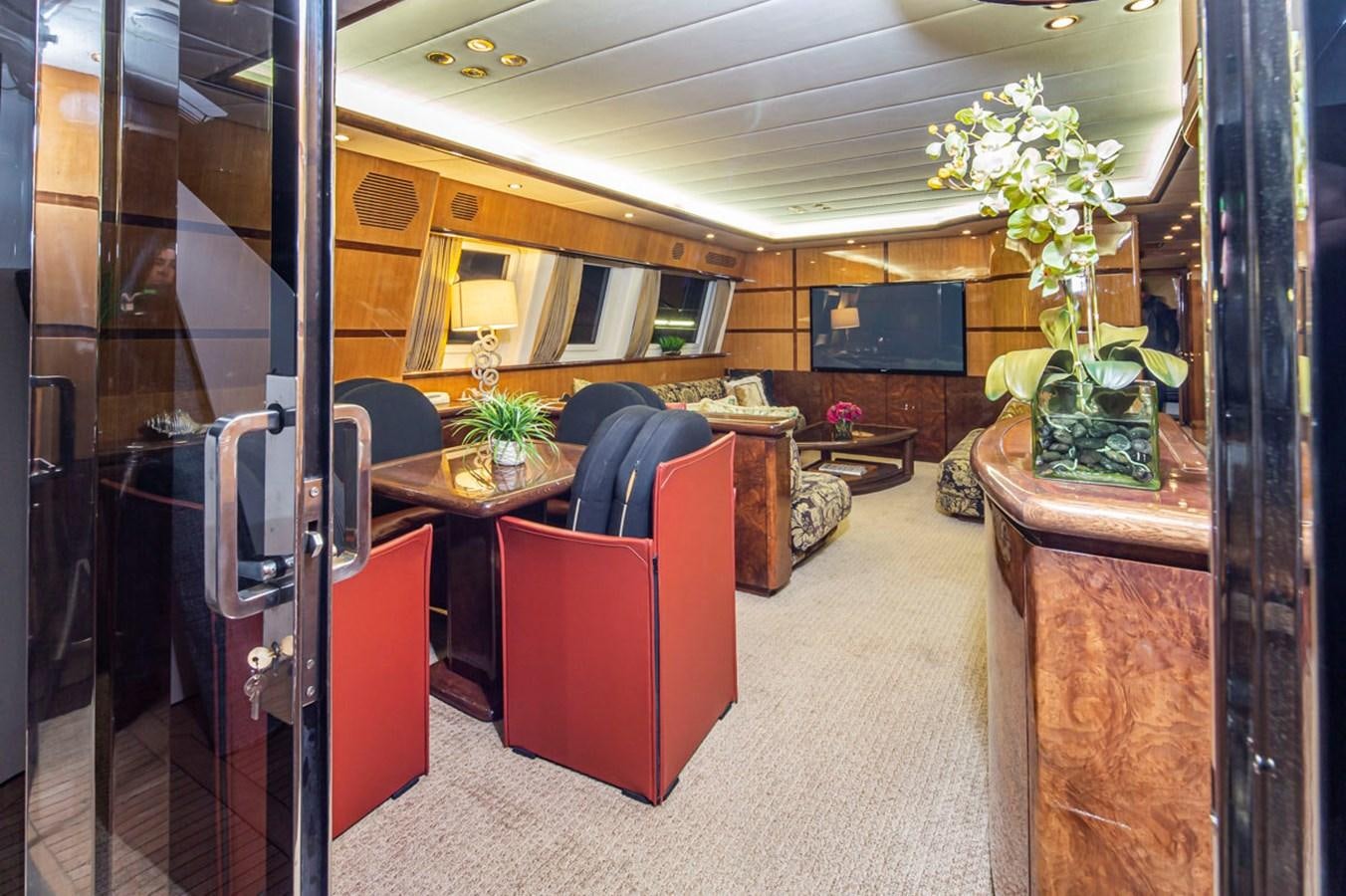 a room with a desk and a chair aboard WILD WAVES Yacht for Sale