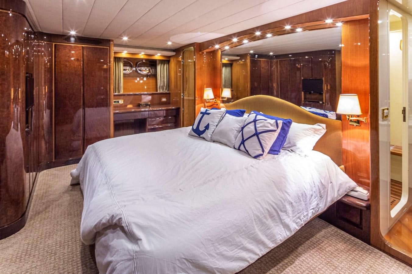 a bed in a room aboard WILD WAVES Yacht for Sale