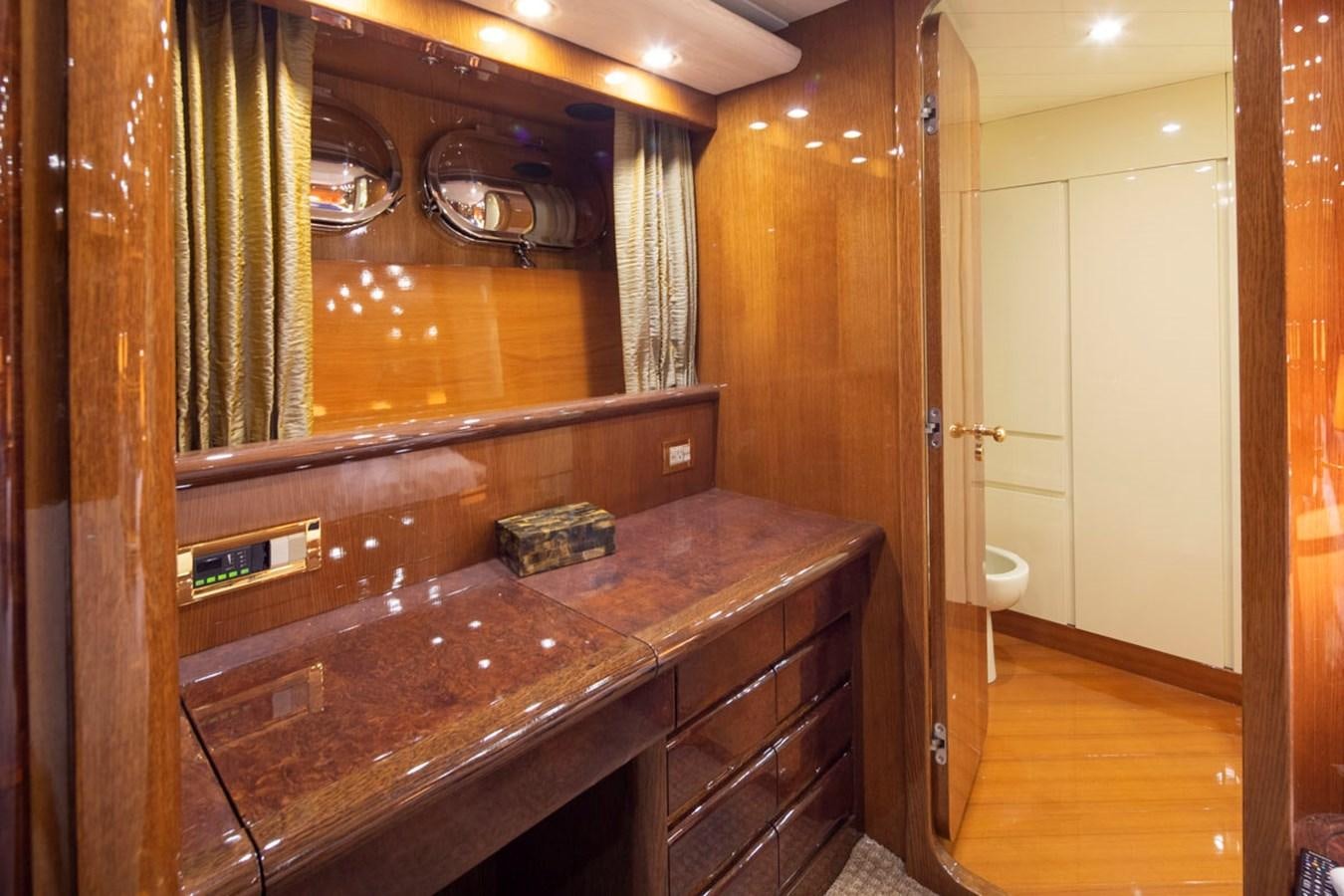 a bathroom with a countertop sink aboard WILD WAVES Yacht for Sale
