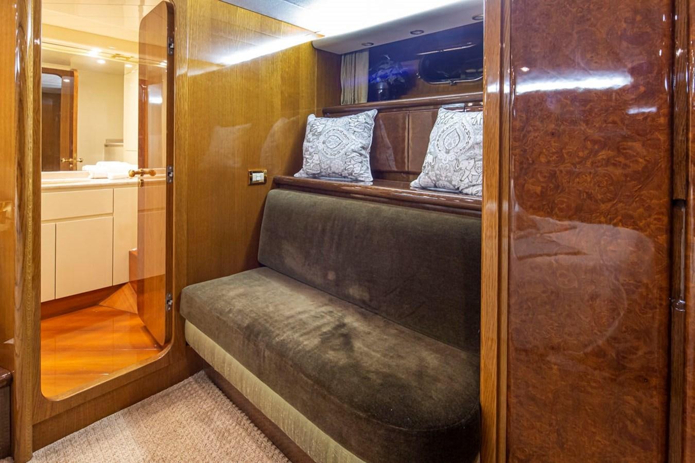 a bed in a room aboard WILD WAVES Yacht for Sale