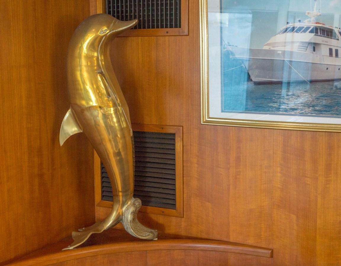 a golden statue of a bird aboard LADY CHARLOTTE Yacht for Sale