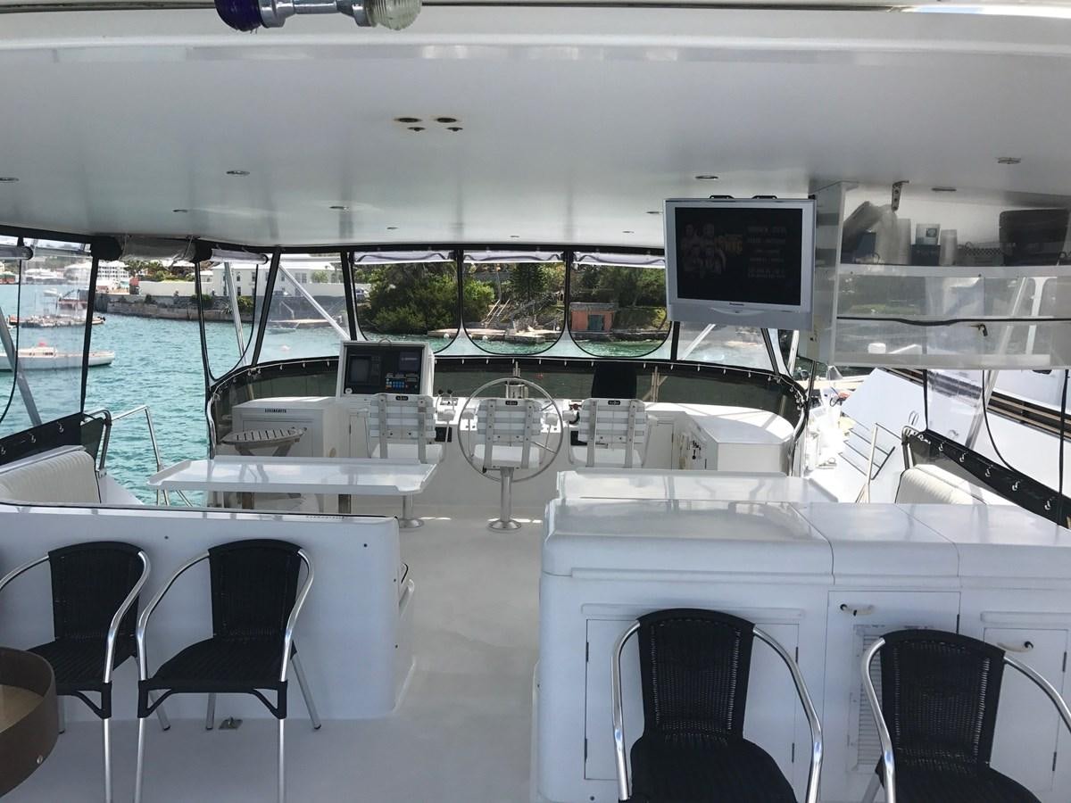a room with computers and chairs aboard LADY CHARLOTTE Yacht for Sale