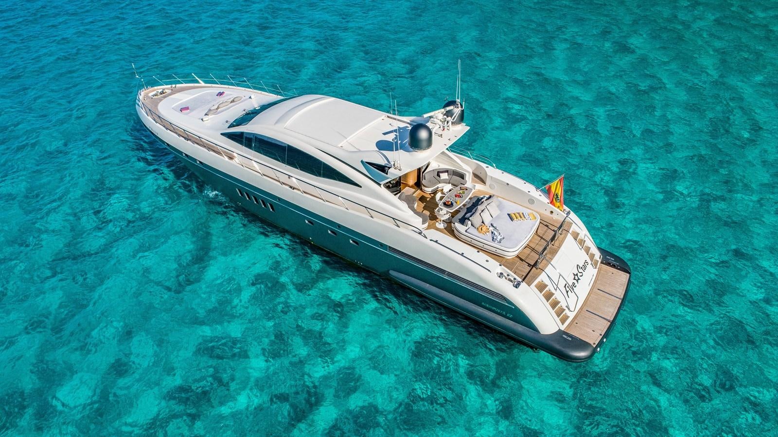 a boat in the water aboard FIVE STARS Yacht for Sale